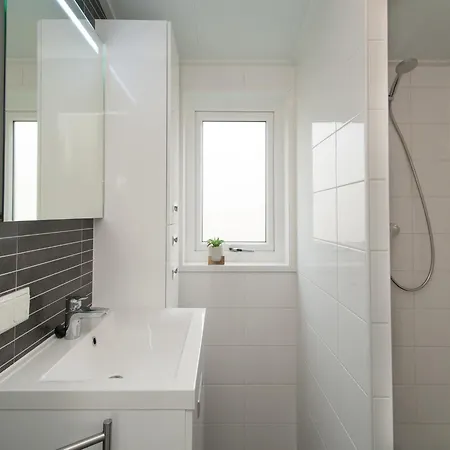 Cozy Beachside Base With Dual Terraces