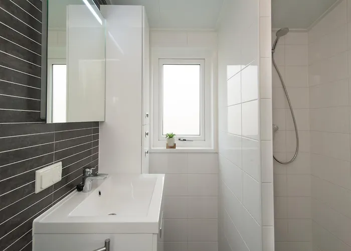 Cozy Beachside Base With Dual Terraces